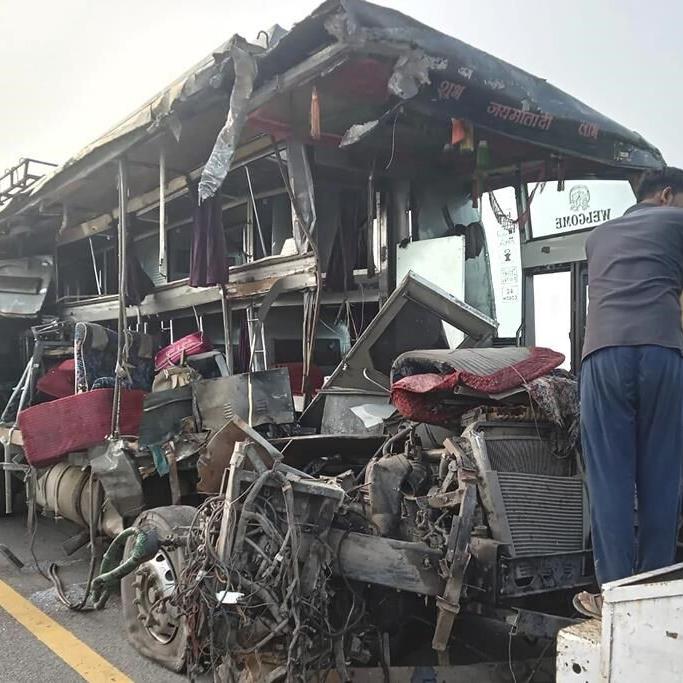 A double-decker bus collides with a milk truck in northern India, killing at least 18 people